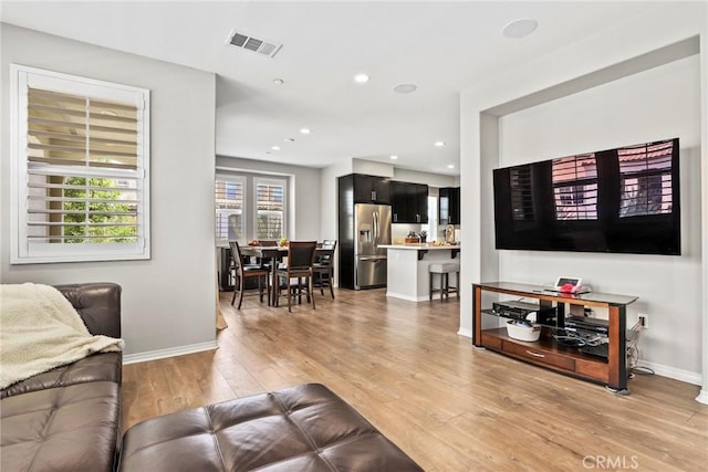 911 Santa Fe Ave Unit A, San Gabriel, CA 91776 - living area featuring light wood-style flooring and recessed lighting