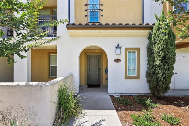 911 Santa Fe Ave Unit A, San Gabriel, CA 91776 - property entrance featuring stucco siding, a balcony, and covered porch