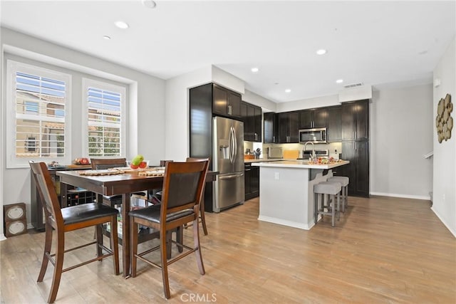 911 Santa Fe Ave Unit A, San Gabriel, CA 91776 - dining room featuring light wood-style floors and recessed lighting