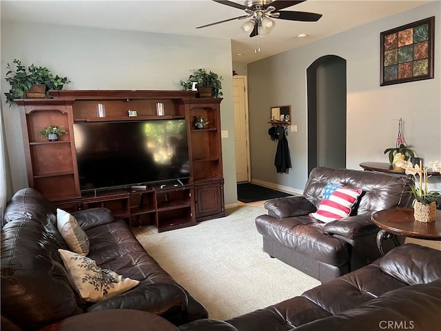 6227 Ocean Jasper Dr, Bakersfield, CA 93313 - carpeted living area featuring a ceiling fan and arched walkways
