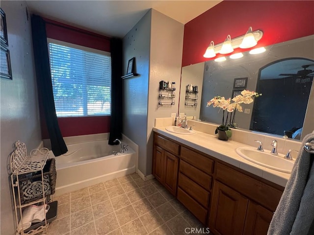 6227 Ocean Jasper Dr, Bakersfield, CA 93313 - bathroom with double vanity and a bath