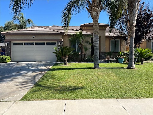 6227 Ocean Jasper Dr, Bakersfield, CA 93313 - view of front of house featuring stucco siding, a garage, concrete driveway, and a front yard