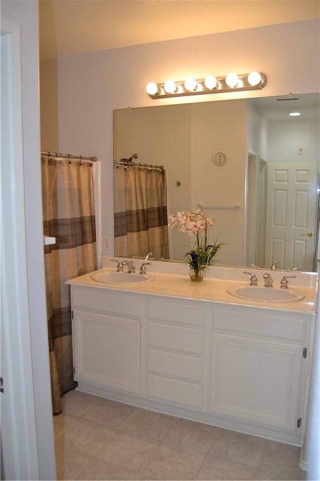 21 Veneto Ln, Aliso Viejo, CA 92656 - full bathroom featuring double vanity and tile patterned floors