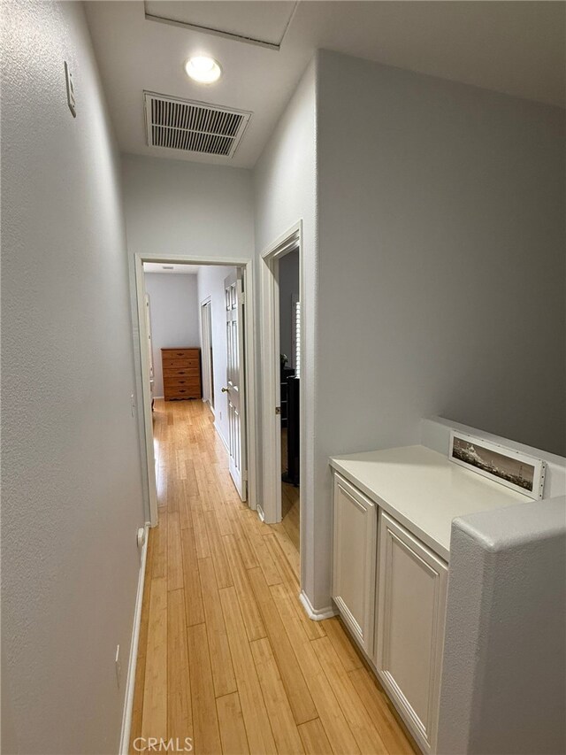 21 Veneto Ln, Aliso Viejo, CA 92656 - hall featuring light wood-style flooring and baseboards