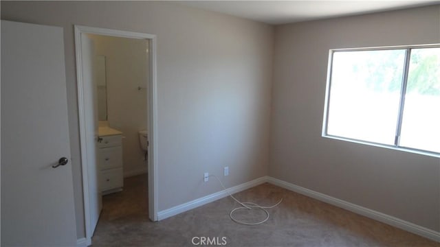 6821 Rocky Grove Ct Unit 13, Yorba Linda, CA 92886 - unfurnished bedroom featuring multiple windows and light colored carpet