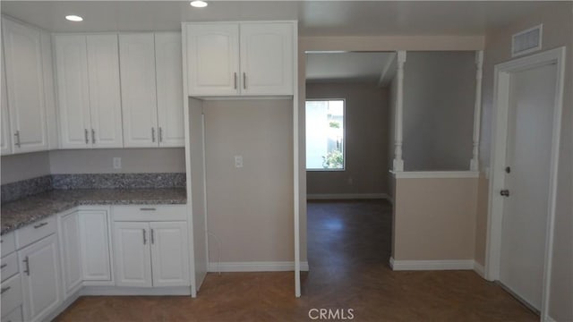 6821 Rocky Grove Ct Unit 13, Yorba Linda, CA 92886 - kitchen featuring white cabinets, recessed lighting, and light stone countertops