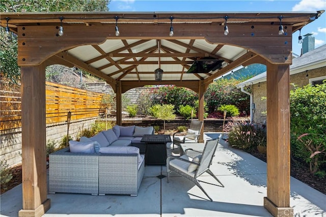 27763 Sequoia Glen Dr, Valencia, CA 91354 - fenced backyard featuring an outdoor hangout area, a gazebo, and a patio area