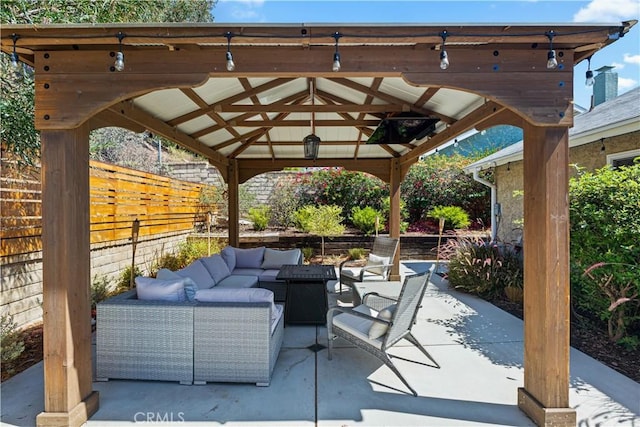 27763 Sequoia Glen Dr, Valencia, CA 91354 - fenced backyard featuring an outdoor hangout area, a gazebo, and a patio area