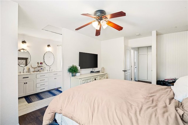 27763 Sequoia Glen Dr, Valencia, CA 91354 - bedroom featuring dark wood finished floors, connected bathroom, and ceiling fan