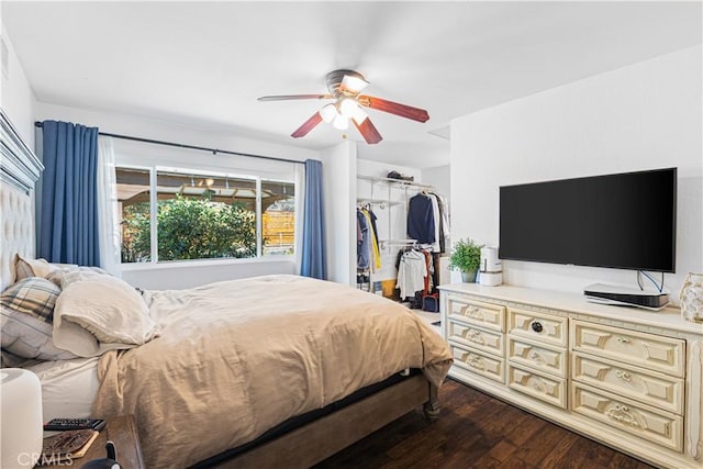 27763 Sequoia Glen Dr, Valencia, CA 91354 - bedroom featuring dark wood-type flooring, a closet, a spacious closet, and a ceiling fan