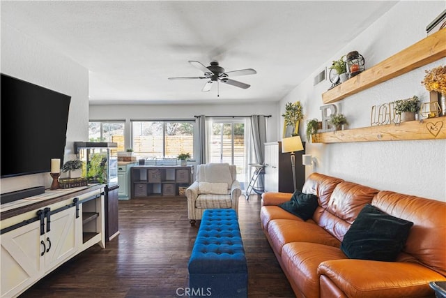 27763 Sequoia Glen Dr, Valencia, CA 91354 - living room featuring ceiling fan and dark wood-type flooring
