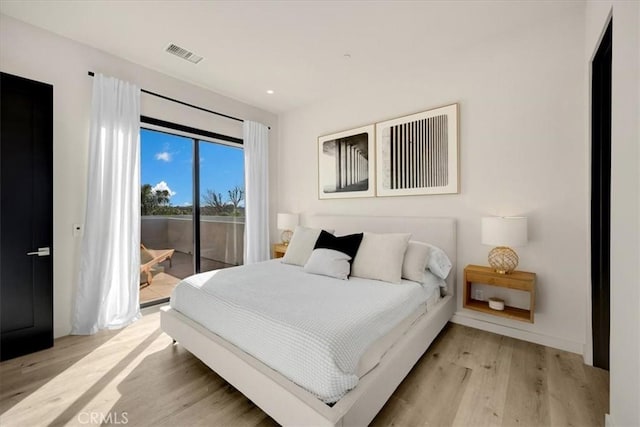 756 W 19th St Unit B, Costa Mesa, CA 92627 - bedroom with access to outside, light wood-type flooring, and recessed lighting