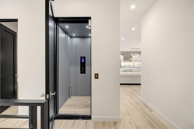 756 W 19th St Unit B, Costa Mesa, CA 92627 - hallway featuring light wood-style floors and recessed lighting