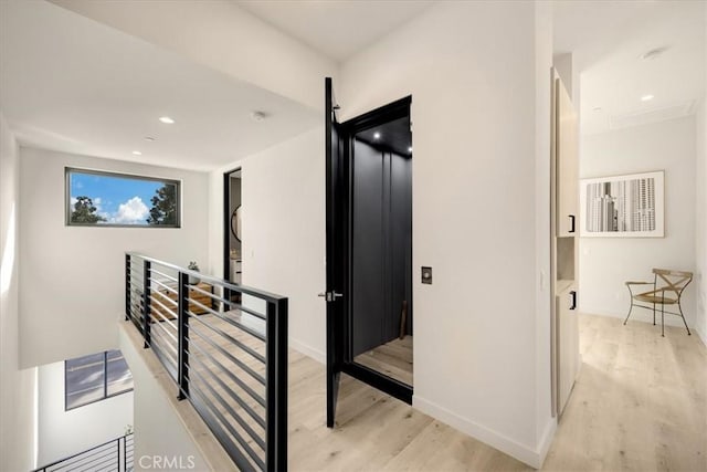 756 W 19th St Unit B, Costa Mesa, CA 92627 - corridor with an upstairs landing, light wood-style flooring, and recessed lighting
