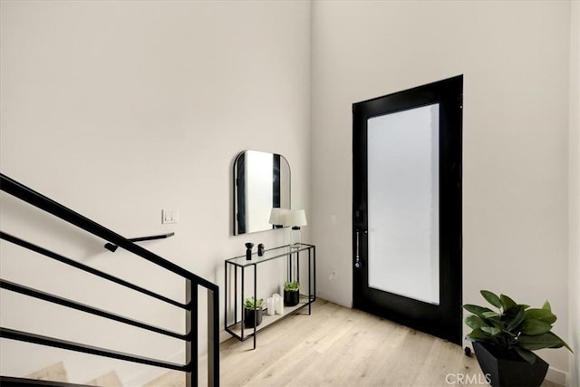 756 W 19th St Unit B, Costa Mesa, CA 92627 - foyer entrance with light wood-style flooring and stairs