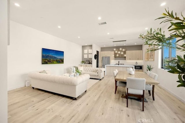 756 W 19th St Unit B, Costa Mesa, CA 92627 - living area with light wood finished floors and recessed lighting