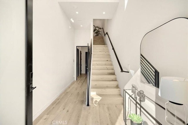 756 W 19th St Unit B, Costa Mesa, CA 92627 - staircase featuring wood finished floors and recessed lighting