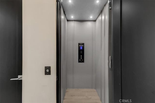 756 W 19th St Unit B, Costa Mesa, CA 92627 - elevator featuring recessed lighting and wood finished floors