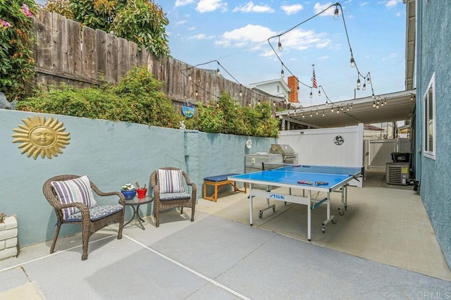 9933 Golden W Ln, Santee, CA 92071 - fenced backyard featuring a patio area and a grill