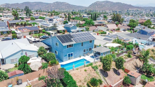 9933 Golden W Ln, Santee, CA 92071 - aerial perspective of suburban area featuring a mountainous background and a pool area