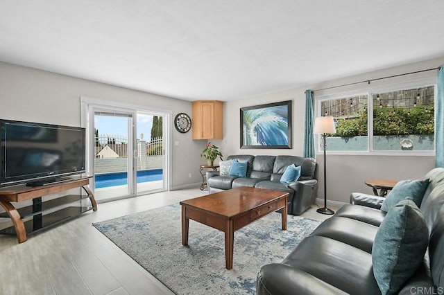 9933 Golden W Ln, Santee, CA 92071 - living room featuring light wood-type flooring and baseboards