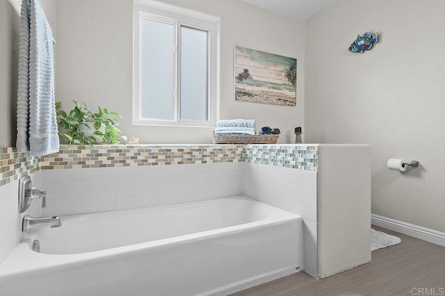 9933 Golden W Ln, Santee, CA 92071 - bathroom featuring a bath and wood finished floors