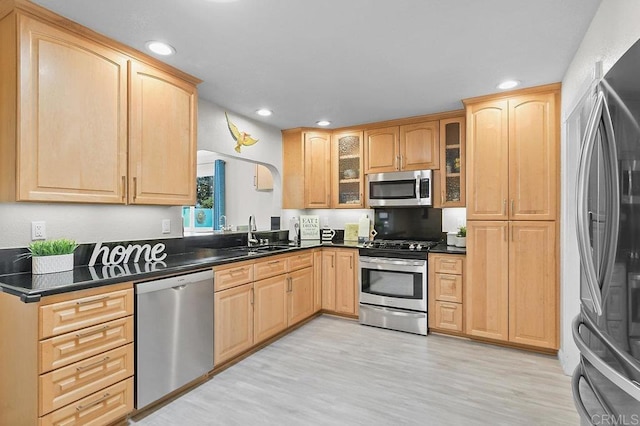 9933 Golden W Ln, Santee, CA 92071 - kitchen featuring appliances with stainless steel finishes, light brown cabinets, dark countertops, and recessed lighting