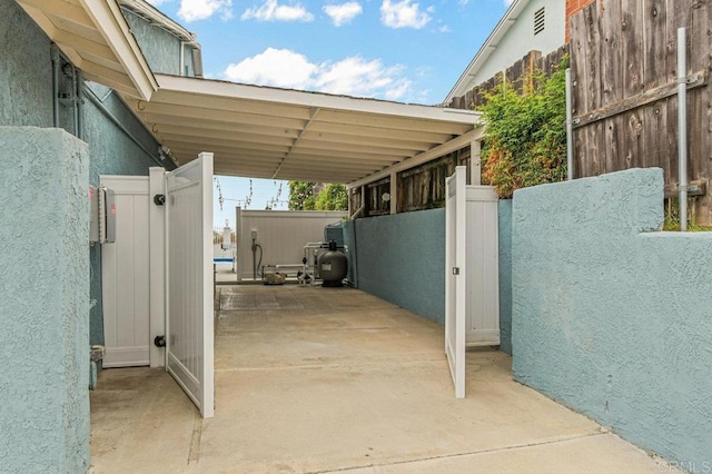 9933 Golden W Ln, Santee, CA 92071 - view of patio / terrace featuring a carport and a gate