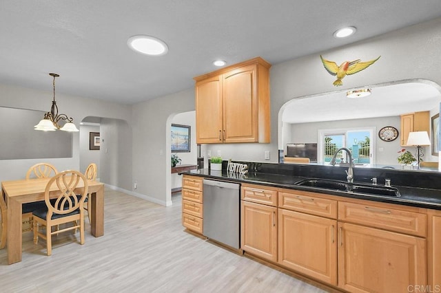 9933 Golden W Ln, Santee, CA 92071 - kitchen featuring stainless steel dishwasher, arched walkways, dark countertops, light wood-style floors, and recessed lighting