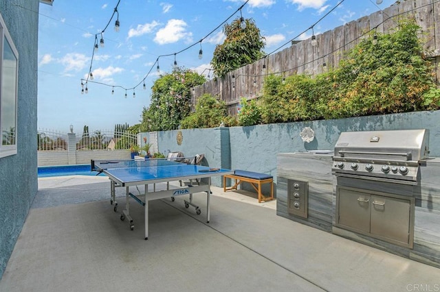 9933 Golden W Ln, Santee, CA 92071 - fenced backyard with a patio area and area for grilling