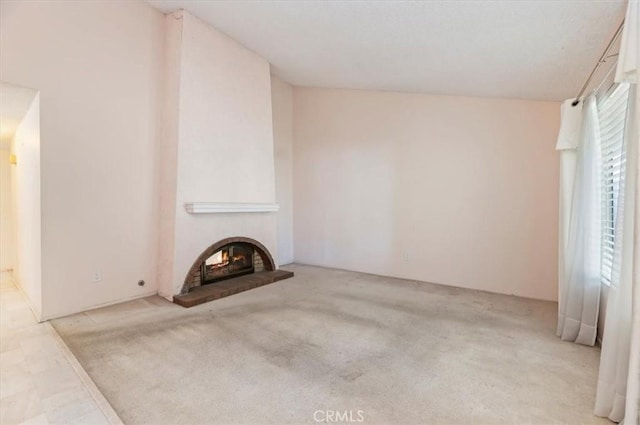 2747 Persimmon Pl, Riverside, CA 92506 - unfurnished living room featuring carpet and a brick fireplace