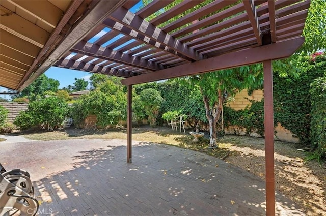 2747 Persimmon Pl, Riverside, CA 92506 - fenced backyard with a patio and a pergola