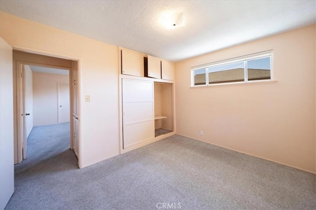 11815 Rimrock Dr, La Mirada, CA 90638 - unfurnished bedroom featuring carpet floors and a textured ceiling
