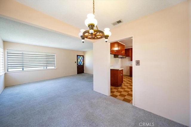 11815 Rimrock Dr, La Mirada, CA 90638 - empty room featuring a chandelier and light carpet