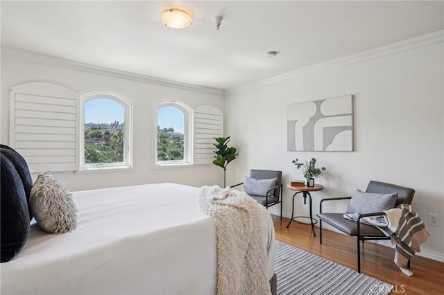 6221 Monterey Rd Unit 402, Los Angeles, CA 90042 - bedroom featuring crown molding and wood finished floors