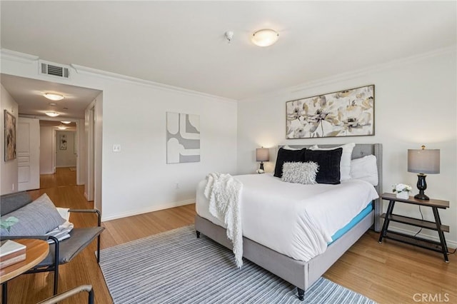 6221 Monterey Rd Unit 402, Los Angeles, CA 90042 - bedroom featuring wood finished floors and crown molding