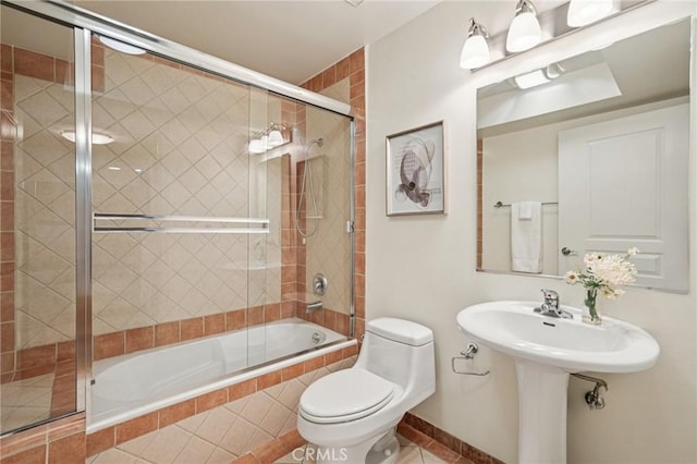 6221 Monterey Rd Unit 402, Los Angeles, CA 90042 - bathroom with tiled shower / bath combo and tile patterned floors