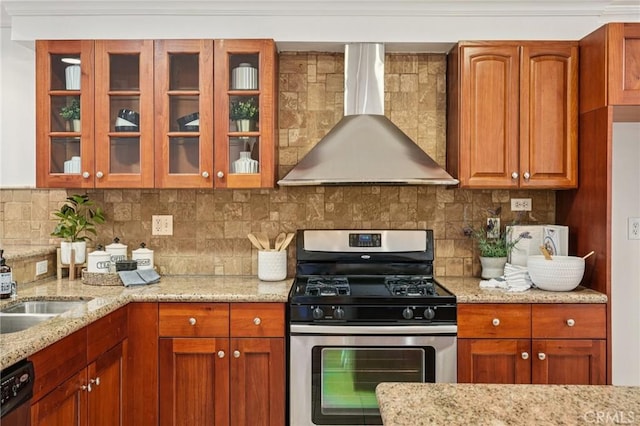6221 Monterey Rd Unit 402, Los Angeles, CA 90042 - kitchen featuring gas range, wall chimney exhaust hood, glass insert cabinets, dishwasher, and light stone countertops