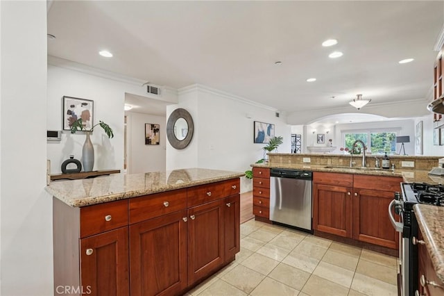 6221 Monterey Rd Unit 402, Los Angeles, CA 90042 - kitchen featuring stainless steel appliances, crown molding, light tile patterned floors, a peninsula, and light stone counters