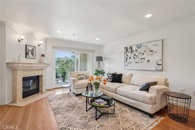 6221 Monterey Rd Unit 402, Los Angeles, CA 90042 - living room featuring wood finished floors, crown molding, a high end fireplace, and recessed lighting