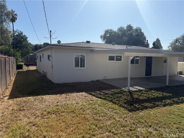 3055 Ronald St, Riverside, CA 92506 - back of property featuring a patio and stucco siding