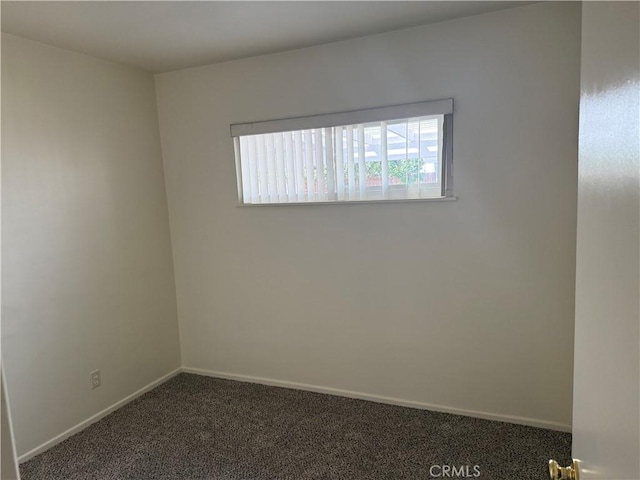 3055 Ronald St, Riverside, CA 92506 - carpeted empty room featuring baseboards