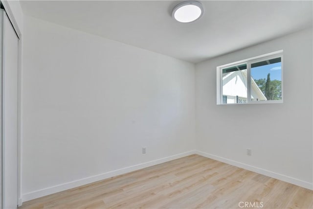156 N Sunset Ave, Banning, CA 92220 - unfurnished room featuring wood finished floors and baseboards