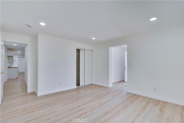 156 N Sunset Ave, Banning, CA 92220 - spare room with light wood finished floors and recessed lighting