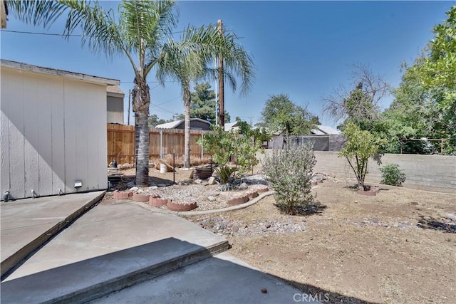 156 N Sunset Ave, Banning, CA 92220 - fenced backyard with a patio