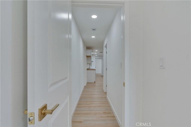 156 N Sunset Ave, Banning, CA 92220 - corridor with recessed lighting and light wood-style flooring