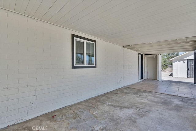 156 N Sunset Ave, Banning, CA 92220 - view of patio featuring a storage unit
