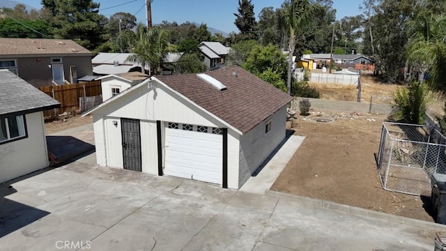 156 N Sunset Ave, Banning, CA 92220 - garage with driveway and a residential view