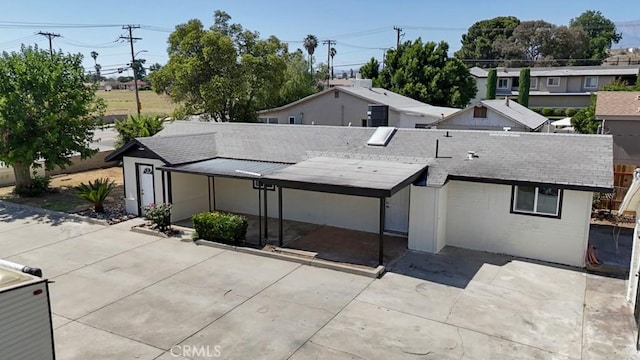 156 N Sunset Ave, Banning, CA 92220 - rear view of house with a shingled roof