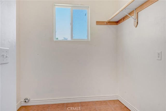 11110 Choctaw Dr, Bakersfield, CA 93308 - walk in closet featuring light tile patterned floors